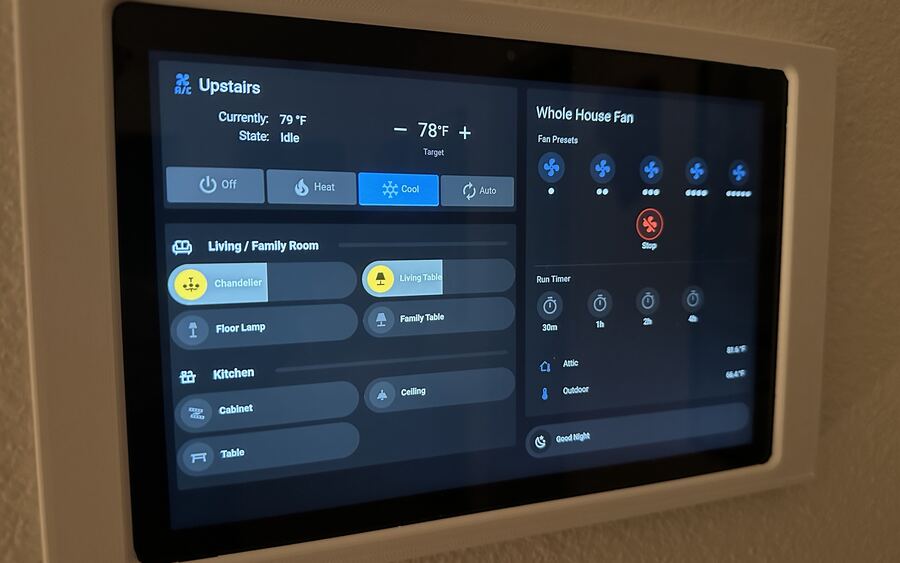 Wall-mounted touchscreen controlling climate, lights and a whole-house fan